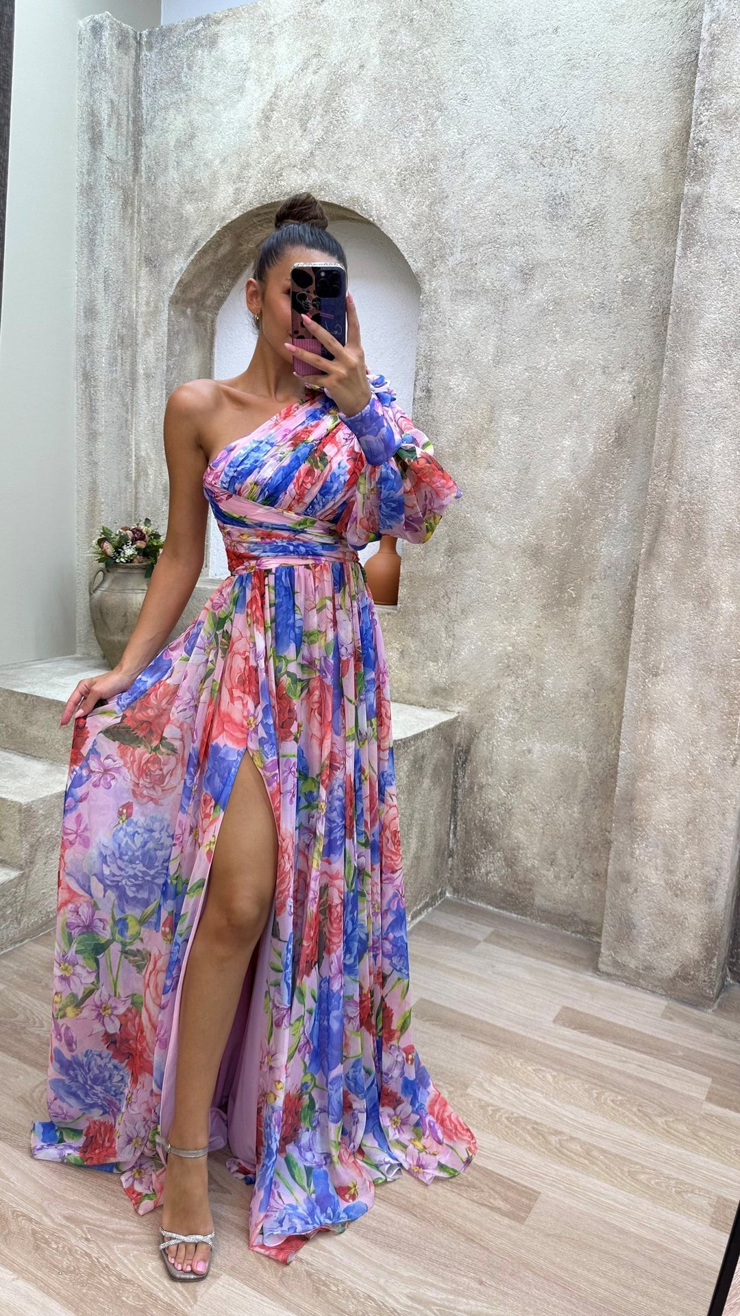 Beautiful women's floral maxi dress with a front slit, offering an elegant summer look.