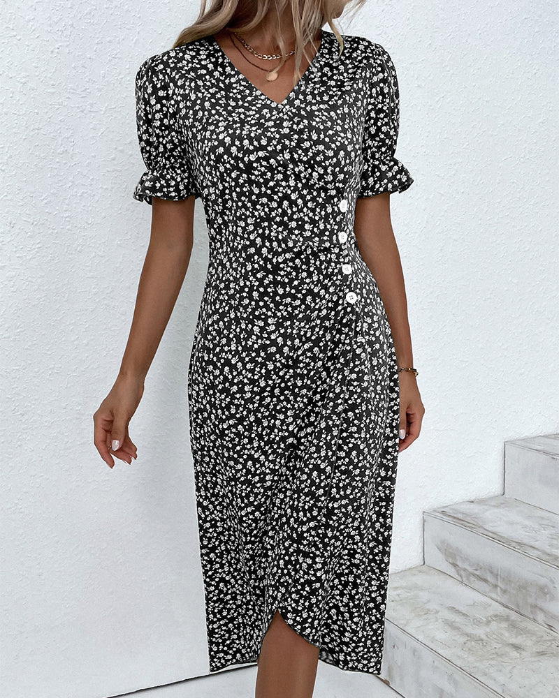 Stylish women's floral V-neck flowy midi dress, captured from a flattering angle. Elegant summer fashion.