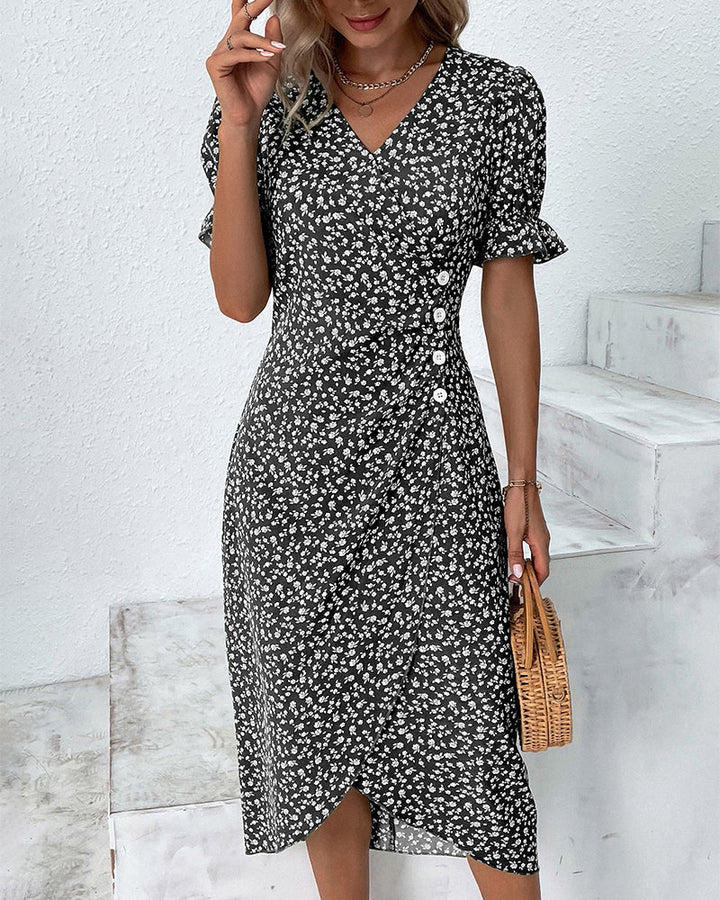 Women's flowy floral V-neck midi dress in motion, showcasing comfortable summer style and elegant drape.