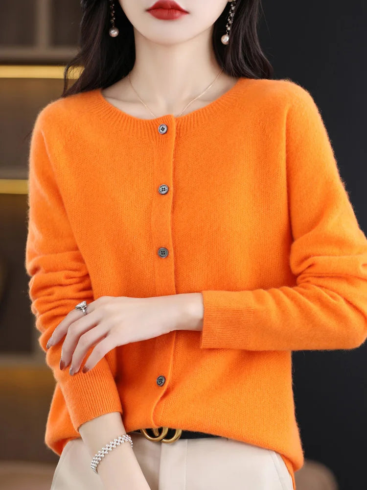 Back view of a women's warm merino wool O-neck pullover, simple yet elegant design