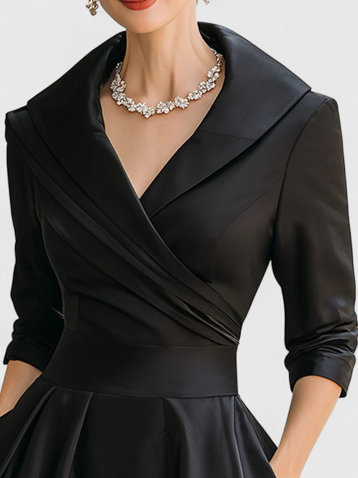 Flattering women's midi dress with classic style for special occasions. Elegant and chic party wear.
