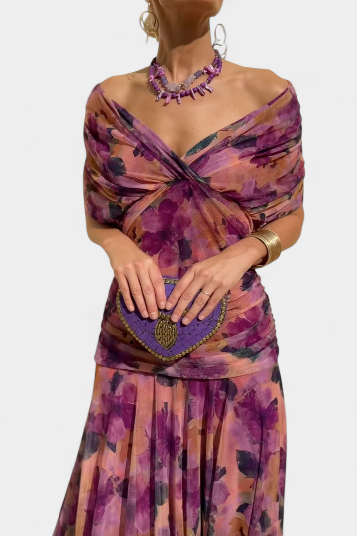 Beautiful women's off-shoulder cocktail dress, featuring a ruched body and stylish twist front.