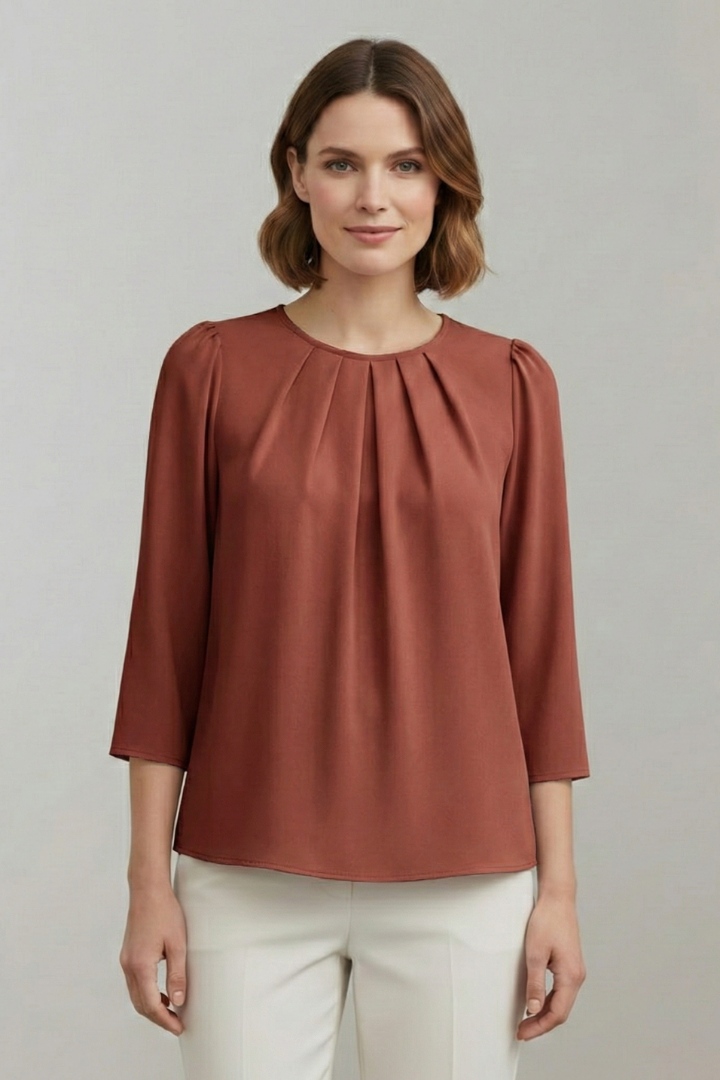 Fashionable women's long sleeve blouse, elegantly pleated, suitable for office and everyday.