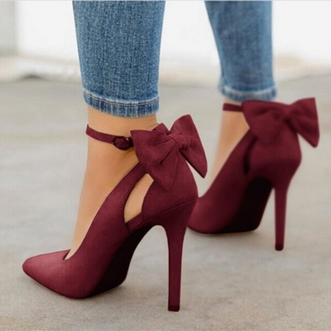 Elegant women's pointed toe high heel court shoes with decorative bow. Perfect for formal events & office chic.