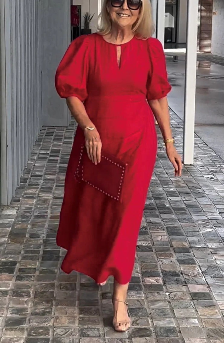 Versatile women's midi dress with elegant puff sleeves. Ideal for spring outfits & casual chic.