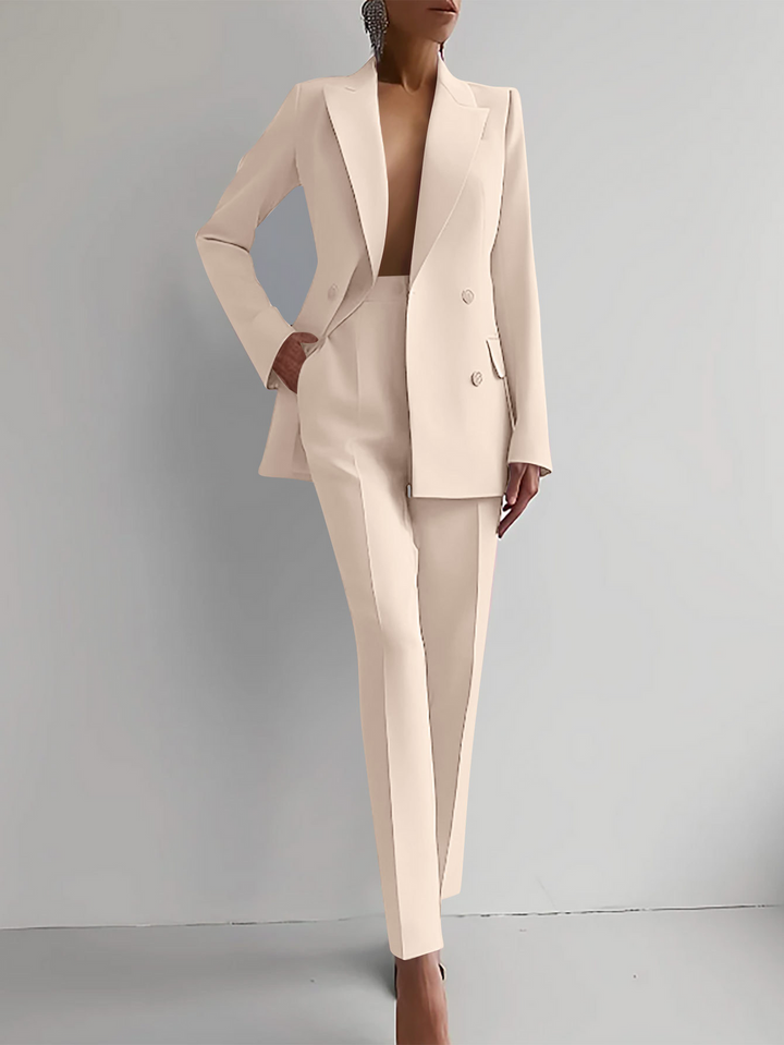 New elegant women's two-piece blazer & trouser set. Stylish professional attire for a modern look.