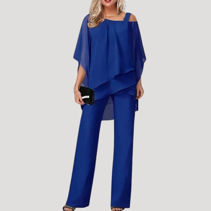 Elegant women's two-piece trouser set with asymmetric top & wide-leg pants, perfect for special occasions.