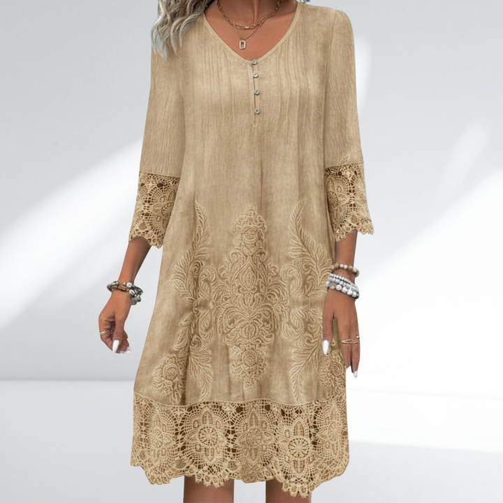 Stylish women's V-neck A-line midi dress, perfect for comfort & elegance. Flattering 3/4 sleeve design.