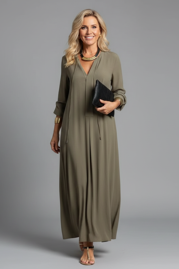 Chic women's V-neck long sleeve dress, ankle length, offering an elegant fall fashion statement.