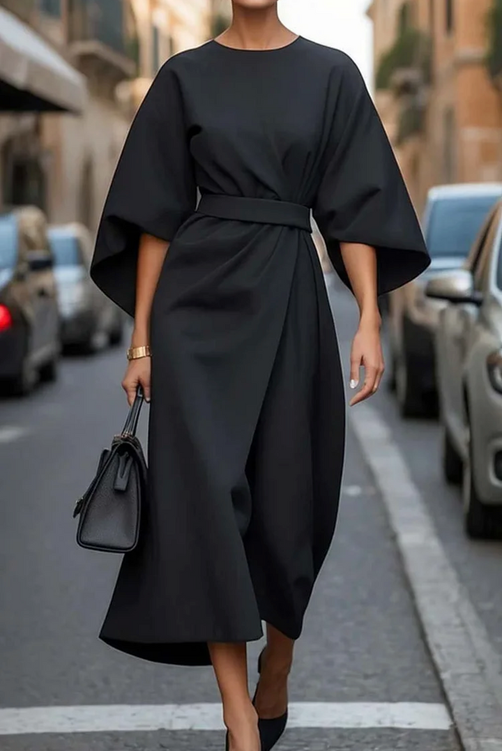 Elegant women's navy blue dress with lantern sleeves, perfect for a sophisticated party or formal event.