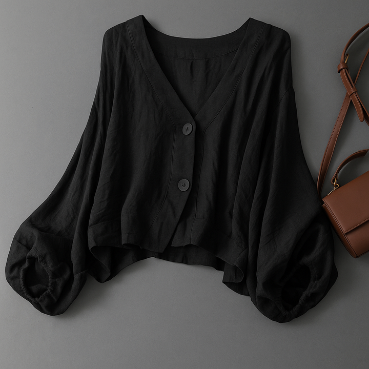 Breathable women's linen blend blouse featuring stylish balloon sleeves, ideal for a versatile and elegant summer fashion look.
