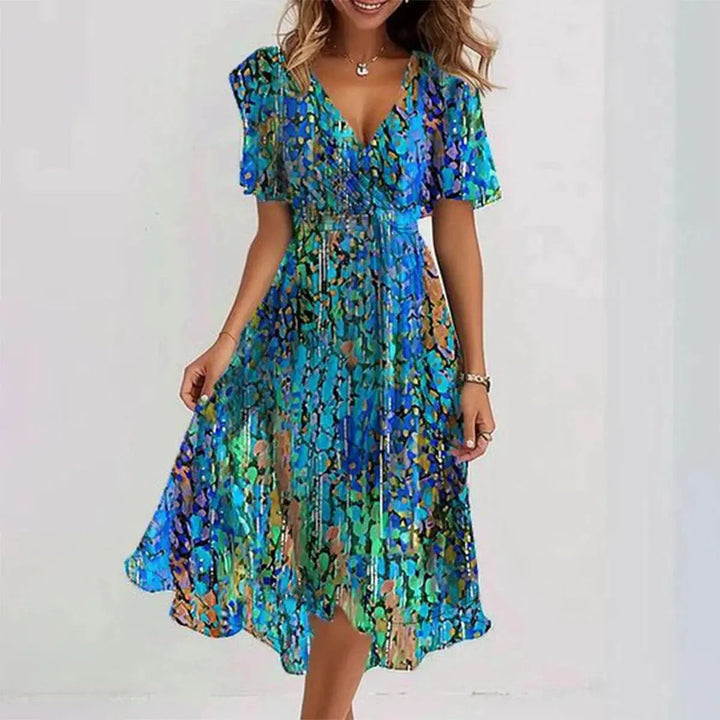 Stylish women's short wrap dress with V-neck, flutter sleeves & belted waist. Ideal for summer casual or elegant wear.
