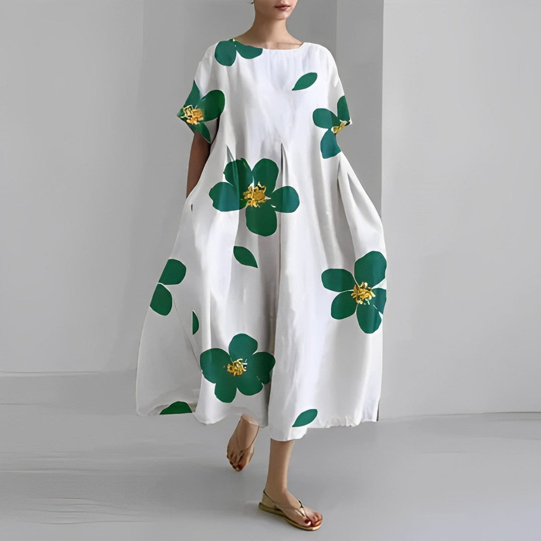 Flowy Boho summer dress with romantic floral print, offering a chic and timeless look, perfect for warm-weather occasions.