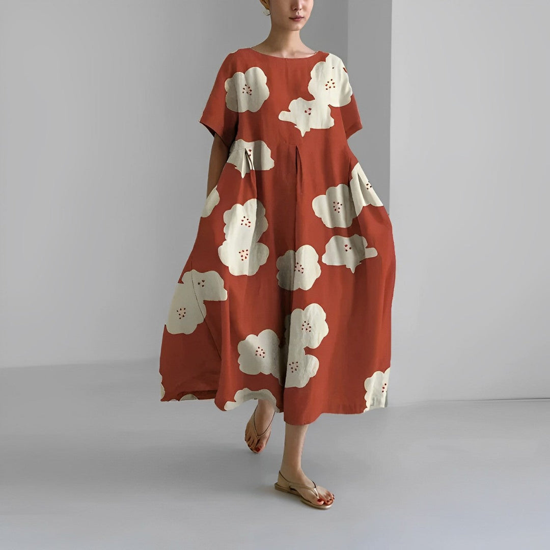 Flowy Boho summer dress with romantic floral print, offering a chic and timeless look, perfect for warm-weather occasions.