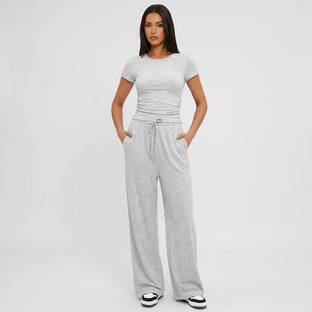 Women's comfort 2-piece lounge set with wide leg pants & matching crop top in soft rayon blend, ideal for casual wear.