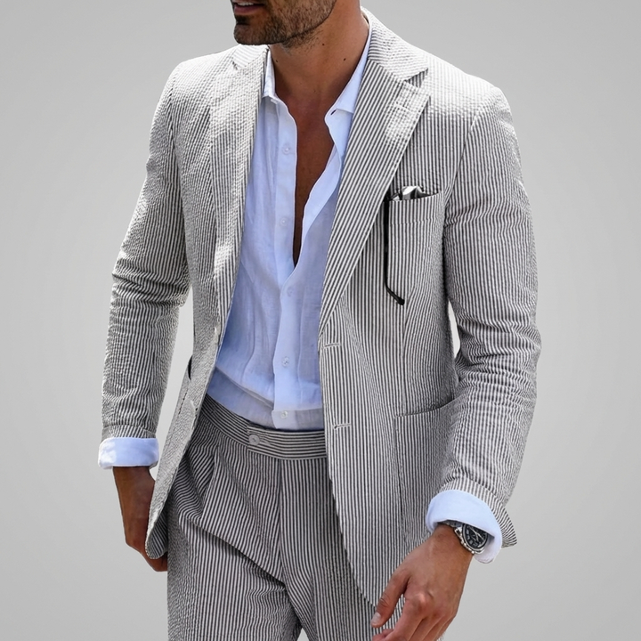 Lightweight men's two-piece pinstripe summer suit with a modern slim fit. Ideal for warm weather formal events.