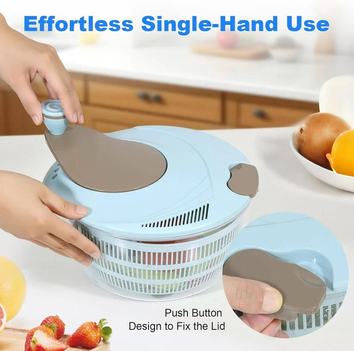 White salad spinner with clear bowl, ideal for quick washing & drying of fresh vegetables & fruits.