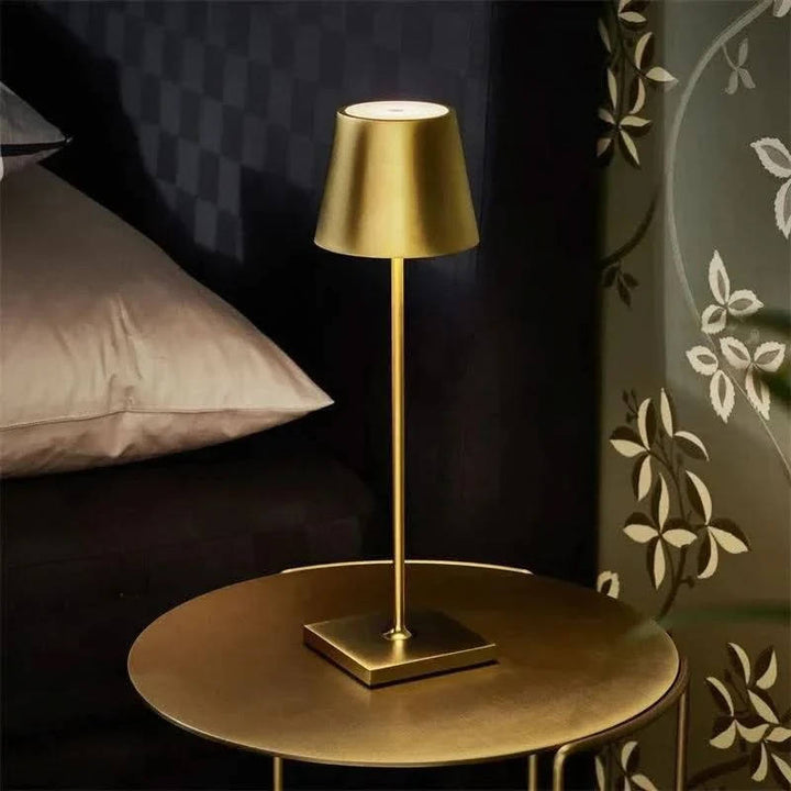 Modern LED table lamp with intuitive touch control. Dimmable light for perfect ambient brightness. Cordless design.