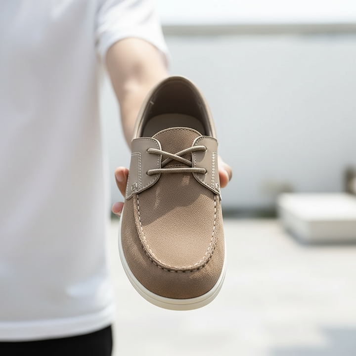 Side view of a men's khaki suede slip-on shoe, emphasizing comfort and relaxed urban aesthetics