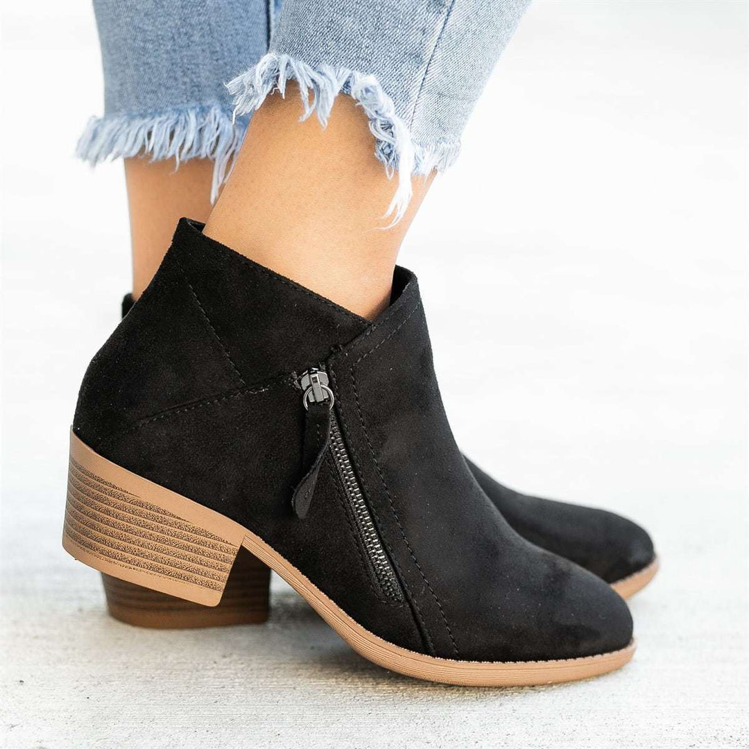 Blue women's chic ankle boots, comfortable and casual, worn with jeans