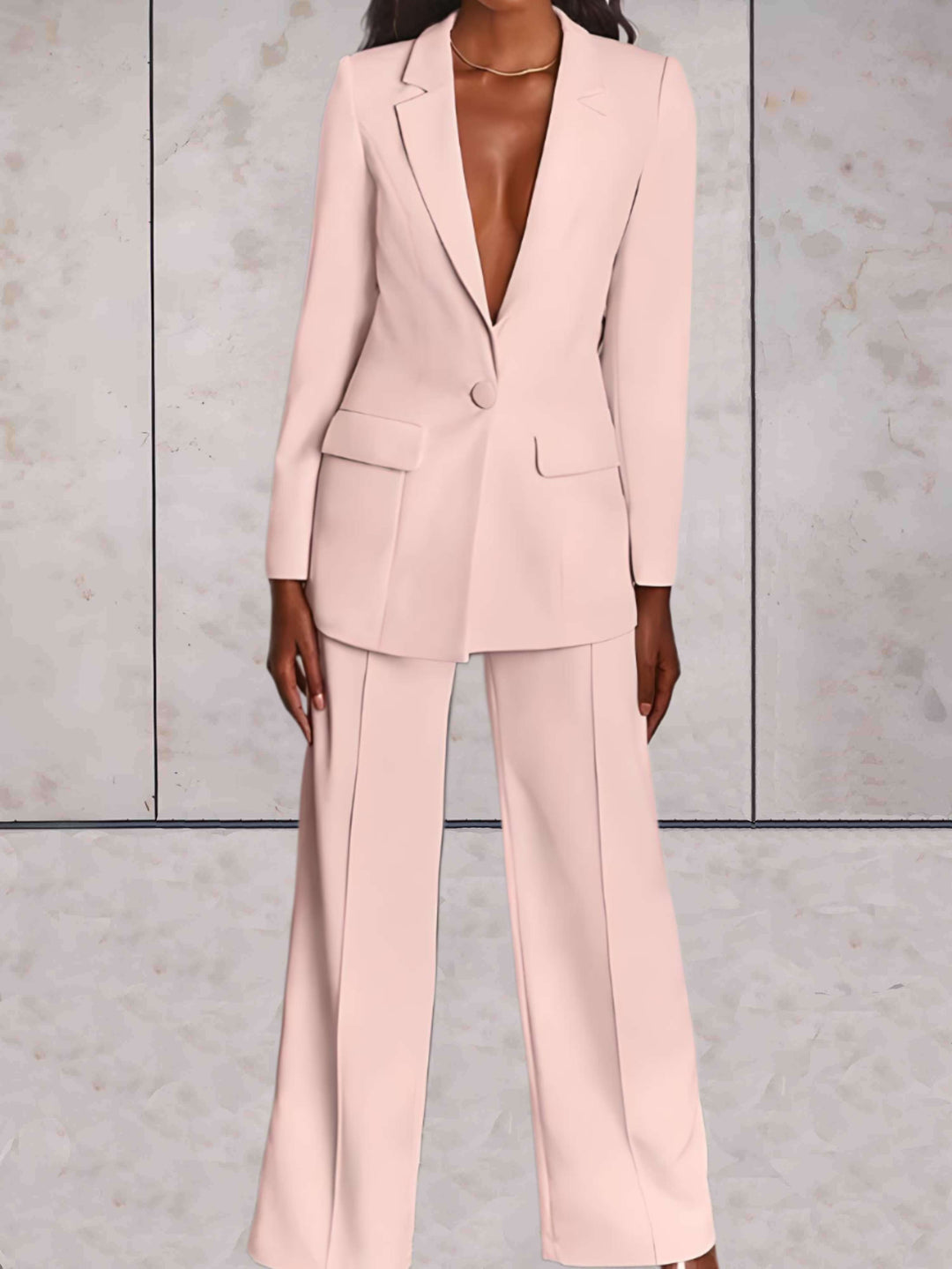 Sophisticated women's tailored blazer & wide-leg pants set, ideal for professional business meetings & office attire.