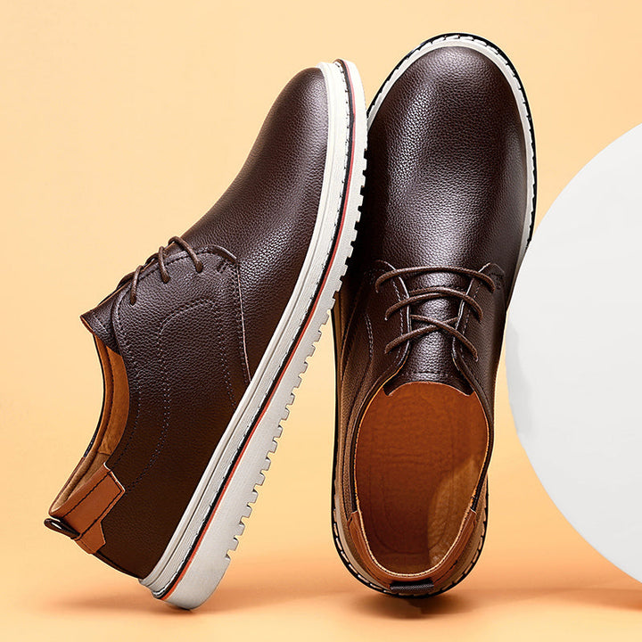 Stylish men's casual leather shoes in a dark brown, suitable for an upscale relaxed look