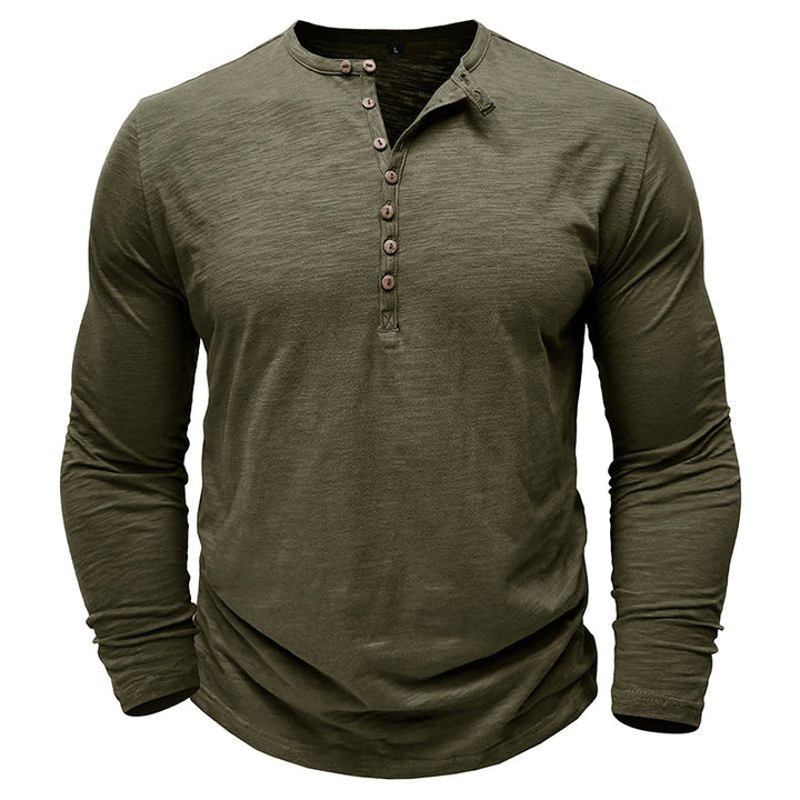 Close-up on the sleeve cuff of a men's classic long-sleeve henley, comfortable & well-made