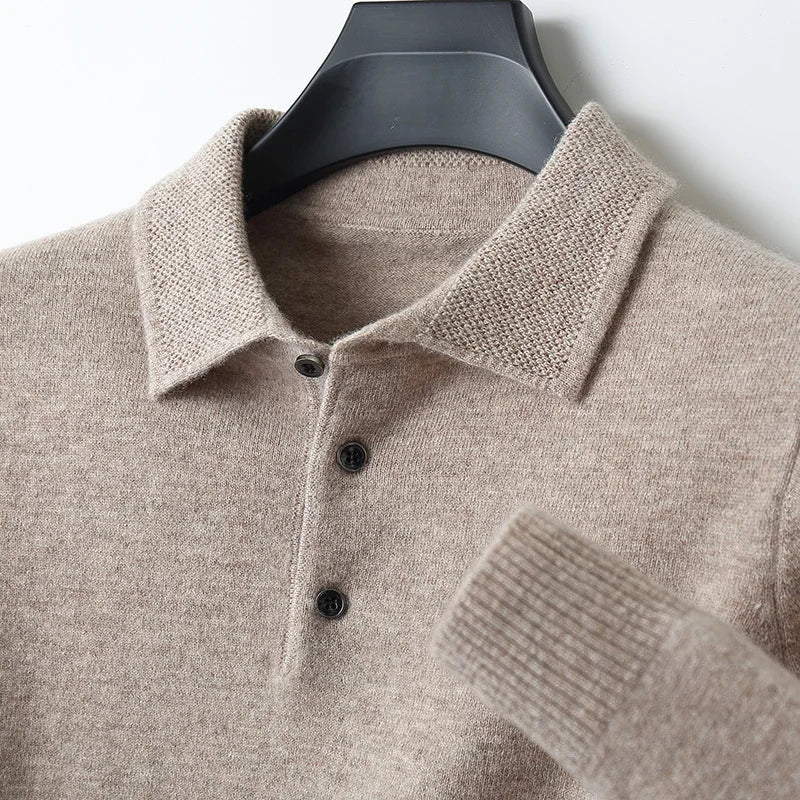 Full shot of a man wearing a cozy merino wool button-up cardigan, paired with a shirt.