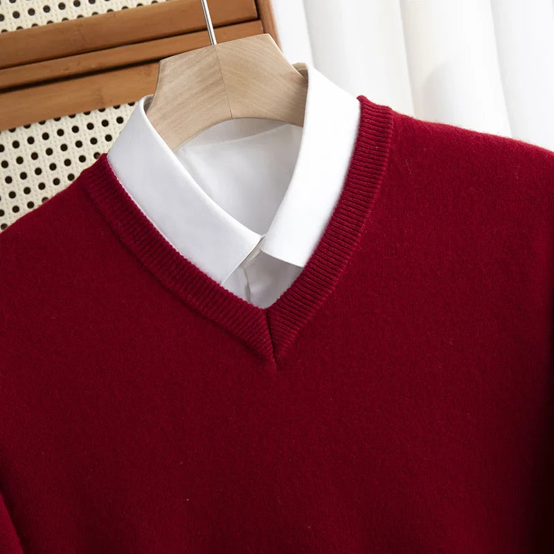 Stylish men's blue merino wool V-neck sweater, perfect casual knitwear for cold weather comfort