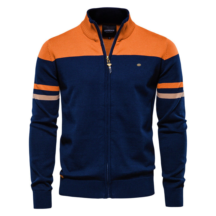 Full length shot of a man modeling a comfortable colorblock zip-up cardigan sweater.
