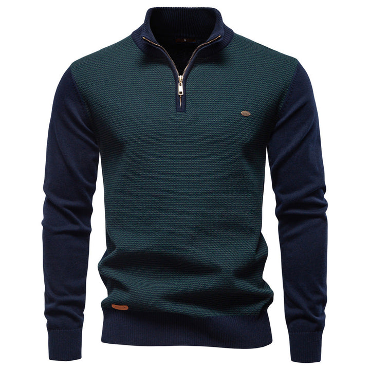 Close-up of men's navy half-zip sweater with ribbed collar, comfortable cotton blend knitwear