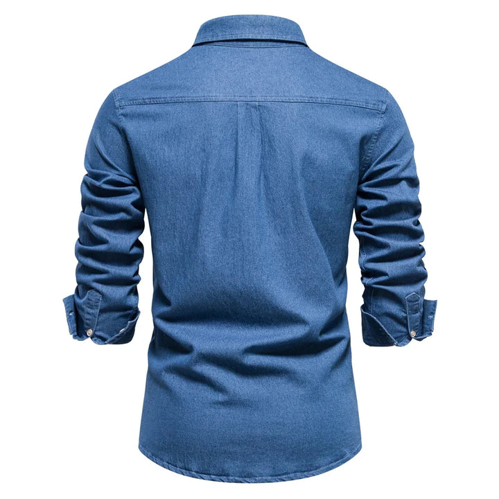 Light blue denim button-up shirt for men, comfortable and fashionable.