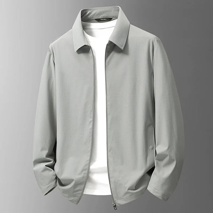 Men's lightweight waterproof performance jacket in black, ideal for outdoor adventures and wet weather.