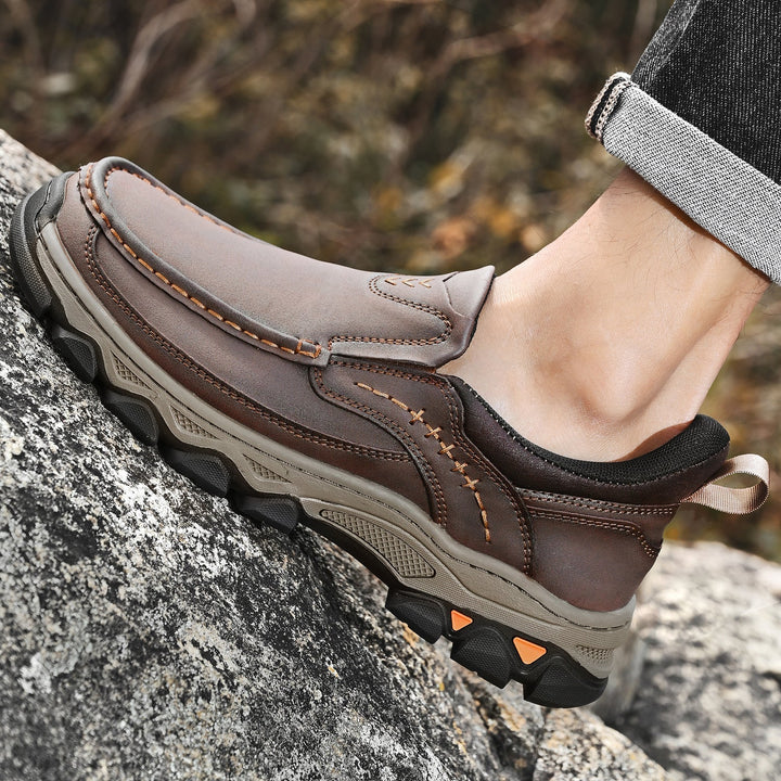 Close-up of the breathable leather upper on men's orthopedic slip-on walking shoes