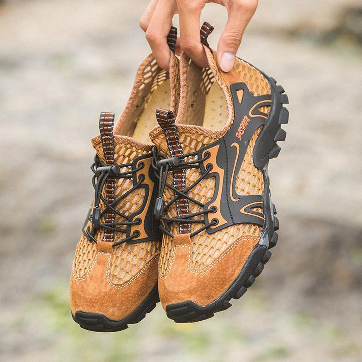 Stylish men's outdoor footwear, waterproof and breathable, for varied terrain and all-day comfort