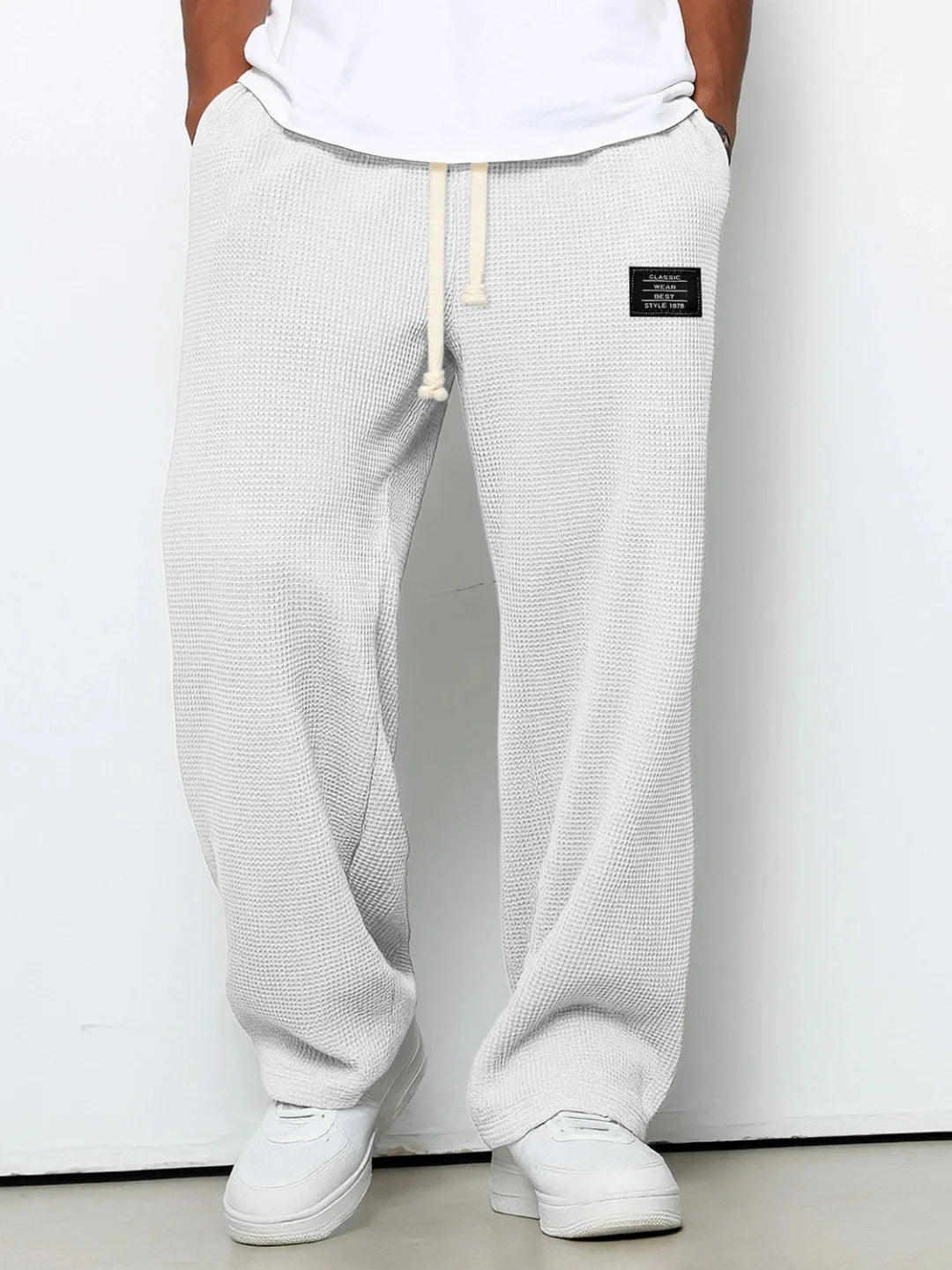 Stylish men's purple relaxed fit lounge pants. Waffle knit fabric & drawstring waist offer ultimate casual comfort.
