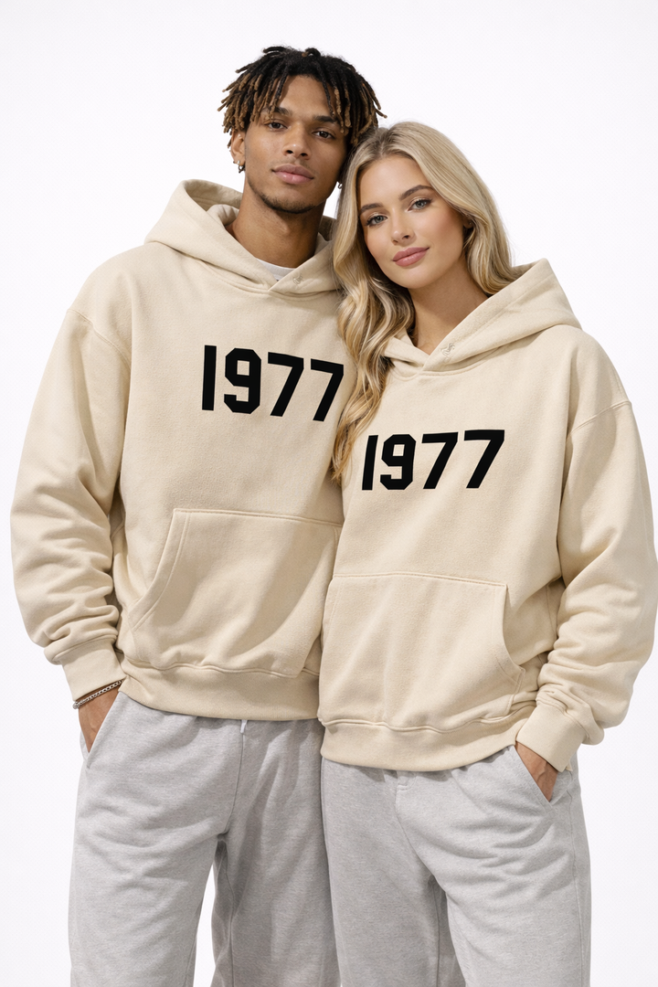 Front view of men's retro 1977 raglan hoodie, showing the urban streetwear style and comfort fit.