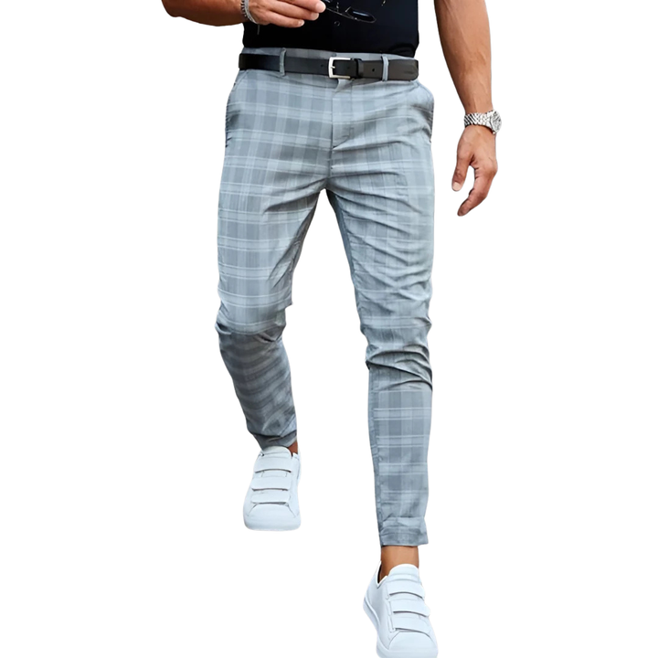 Stylish men's cropped checked pants, slim fit and tapered, perfect for smart casual fashion.