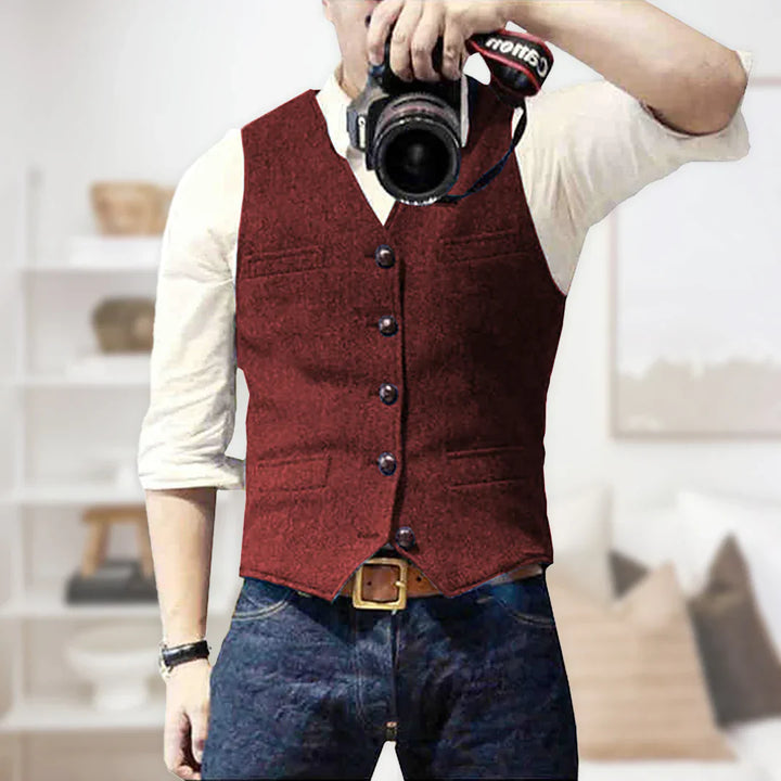Men's slim fit herringbone tweed vest. Ideal for formalwear, business attire, and wedding outfits. Classic style.
