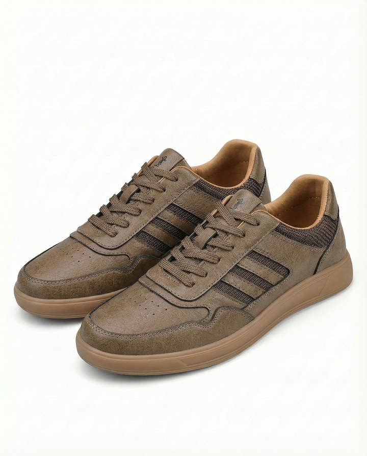 Detailed shot of the sole of men's everyday leather comfort trainers, highlighting traction