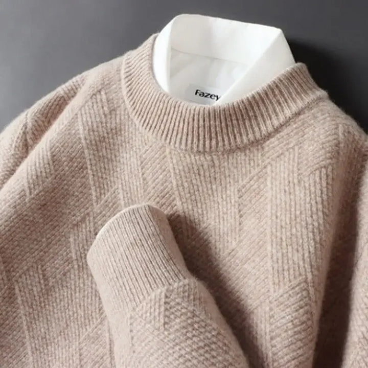 Close-up of a men's crew neck sweater, showcasing its unique textured knit pattern and soft cotton blend.