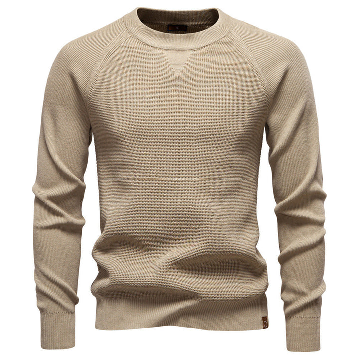 Texture of the viscose blend fabric on a men's waffle knit sweater, soft and warm.