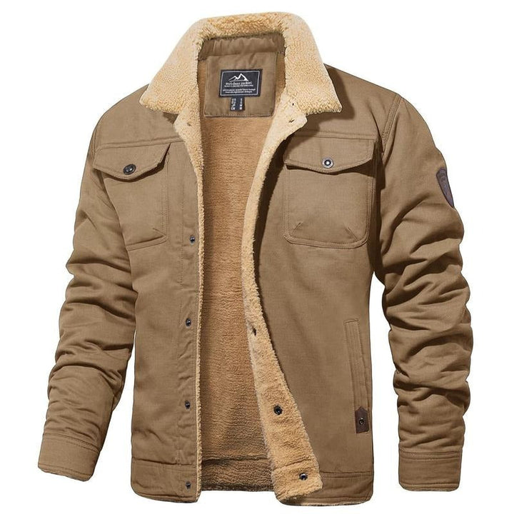 Close-up of the sherpa lining and durable canvas fabric on a men's winter jacket.