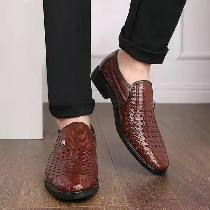 Elegant men's dress shoes, featuring a woven leather design and convenient slip-on functionality.