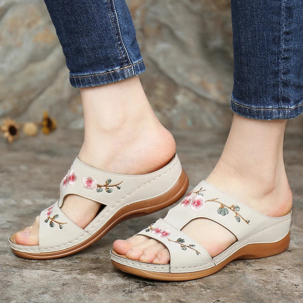 Feel relief with Florina women's orthopedic floral sandals, designed for arch support & ultimate comfort.
