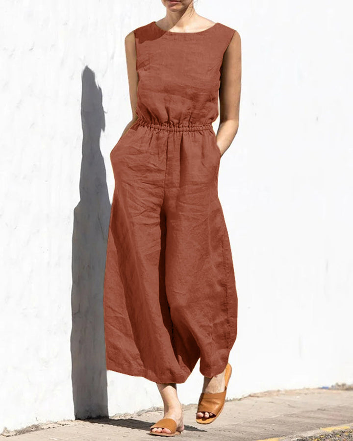 Back view of women's sleeveless wide leg jumpsuit, highlighting its elegant and versatile summer apparel design.