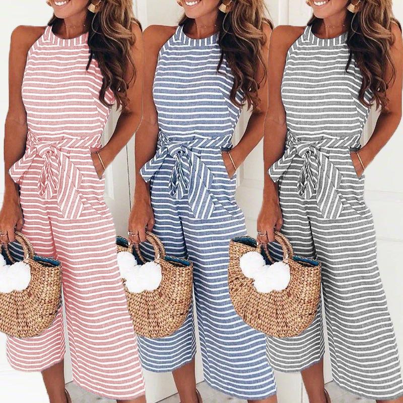 Trendy women's striped wrap neck wide-leg jumpsuit, embodying modern summer fashion and elegance.