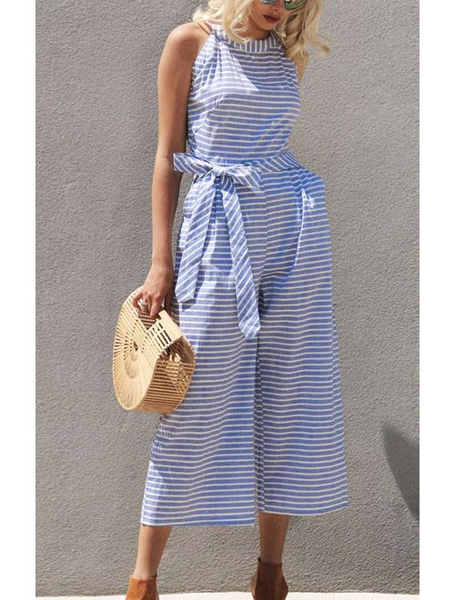 Woman modeling a fashionable striped wrap neck wide-leg jumpsuit, perfect for elegant summer wear.