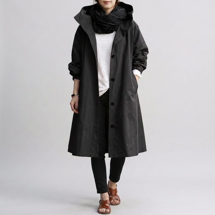 Fashionable oversized rain jacket for women. Ideal spring/fall coat, offering stylish wet weather protection.