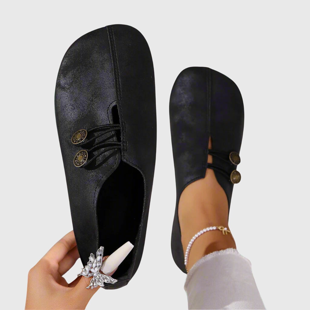 Comfortable women's slip-on flats for summer. Lightweight and flexible casual footwear with decorative button.